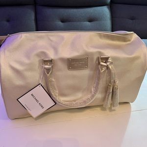 Michael Kors sparkly light gold duffle bag